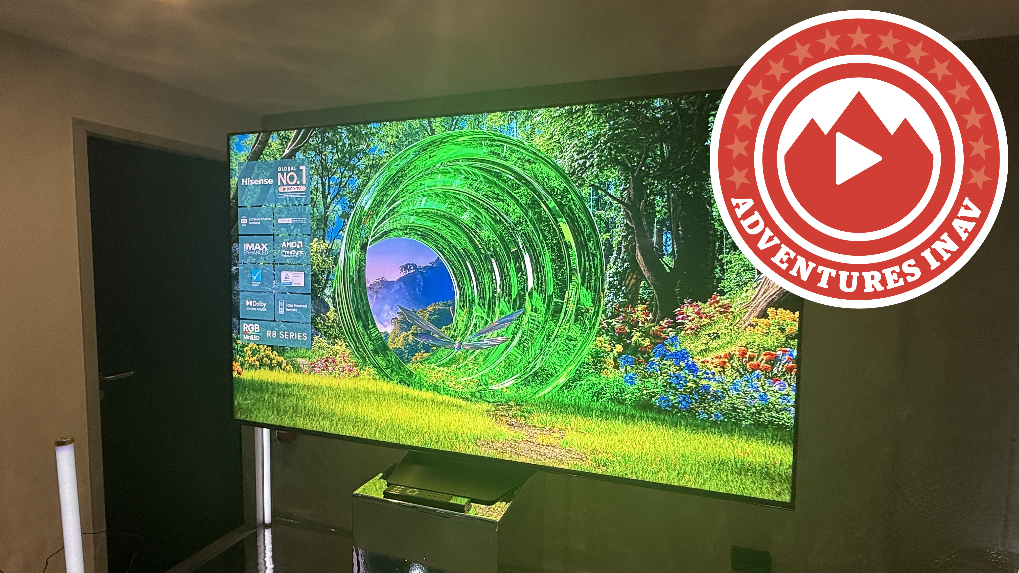 A Hisense RGB Mini LED TV with a fantasy CGI image on screen