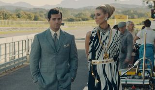 The Man From UNCLE Henry Cavill strolls with Elizabeth Debicki in a classic Bond style suit