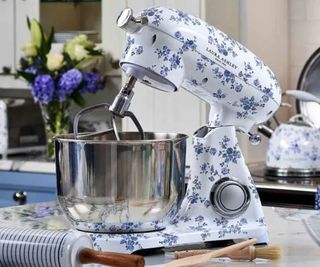 A Laura Ashley & VQ stand mixer on a marble surface