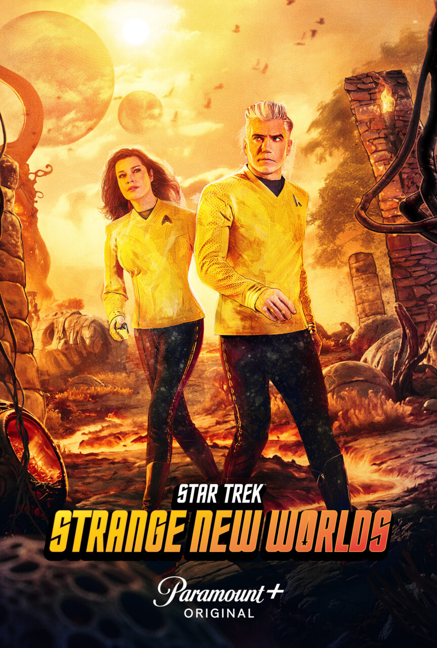 Two yellow-shirted sci-fi characters on an alien world