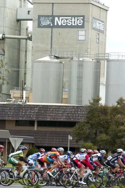 Riders pass by a Nestle factory in Tongala but didn't have time to stop for some chocolate tasting early into the first stage.