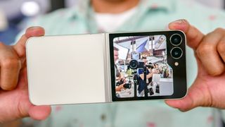 Samsung Galaxy Z Flip 7 FE held in the hand.