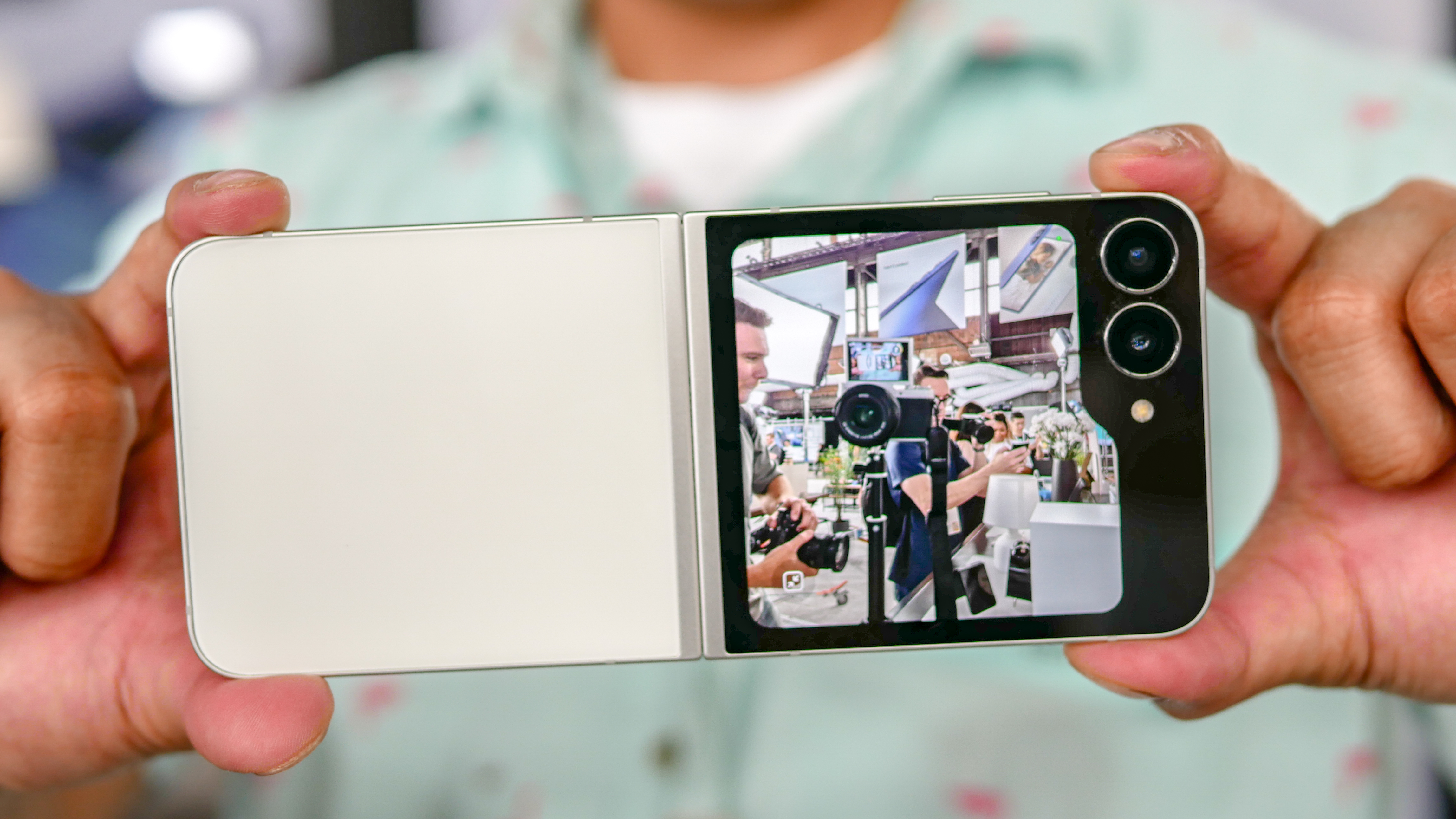 Samsung Galaxy Z Flip 7 FE held in the hand.
