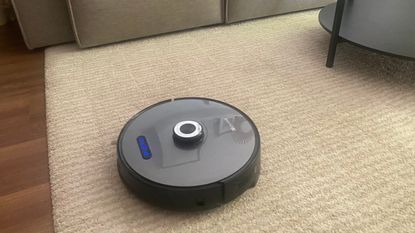Proscenic M8 Pro robot vacuum cleaner on Annie's rug
