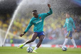 Tammy Abraham warms up for Chelsea ahead of the UEFA Super Cup in 2021.