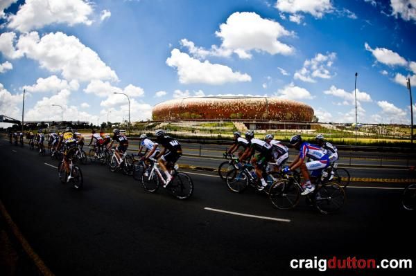 The peloton passes Soccer City