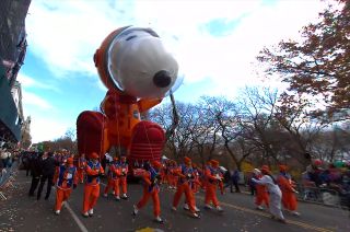 Astronaut Snoopy takes flight as a giant balloon in the 93rd Macy's Thanksgiving Day Parade in New York City, Nov. 28, 2019.