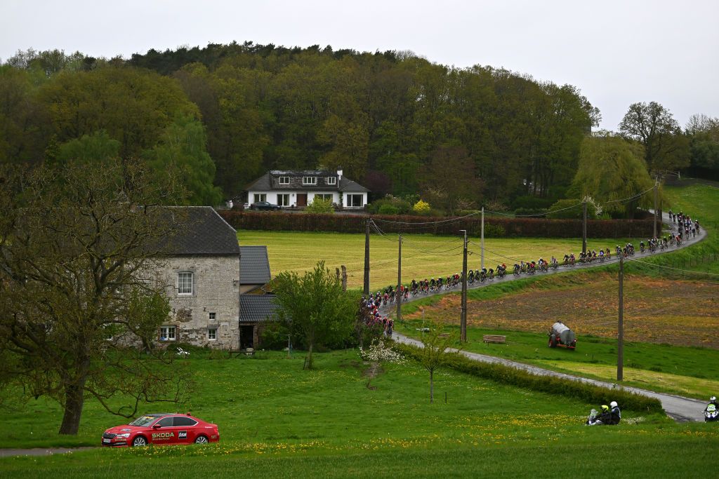 HUY BELGIUM APRIL 17 A general view of the peloton passing through a landscape during the 27th La Fleche Wallonne Feminine 2024 a 146km one day race from Huy to Huy UCIWWT on April 17 2024 in Huy Belgium Photo by Luc ClaessenGetty Images