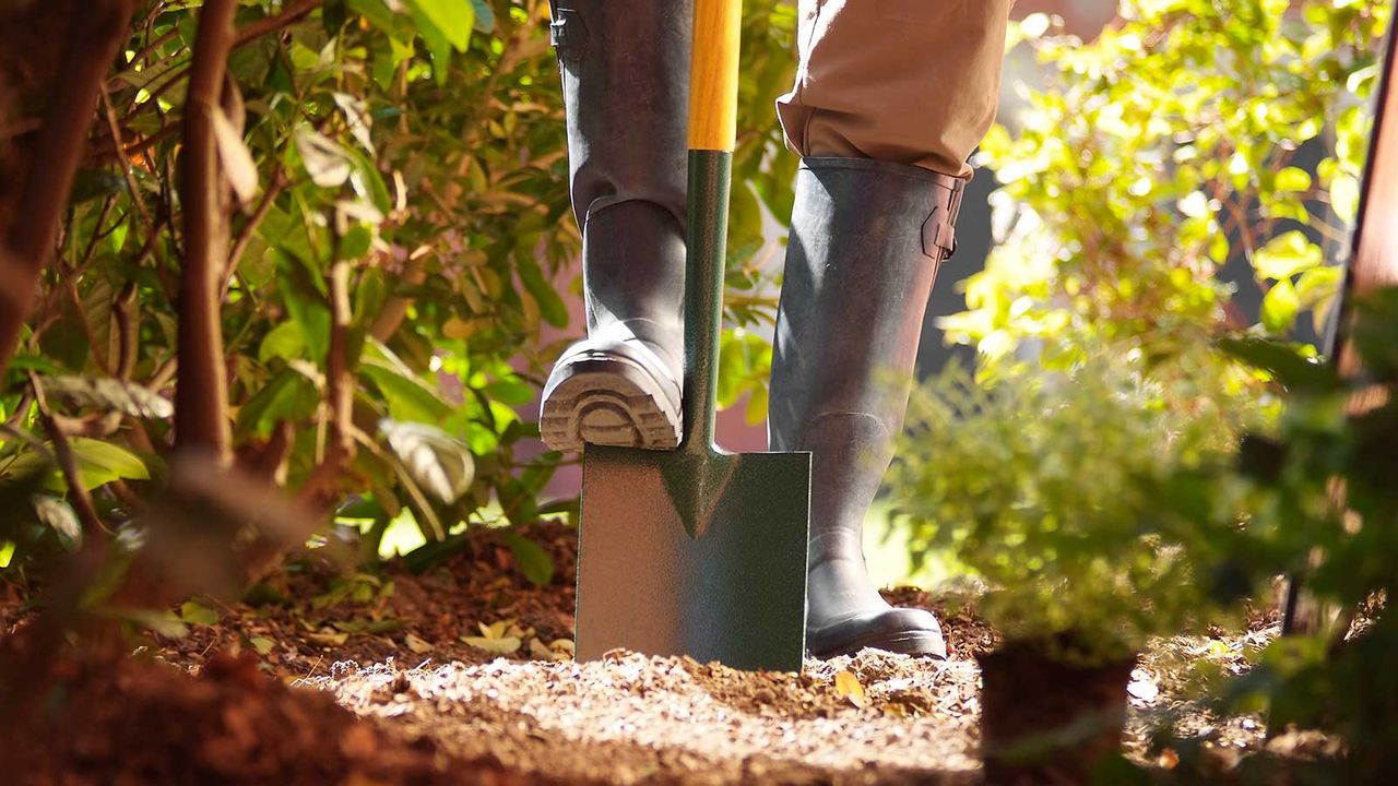 digging in garden with garden spade