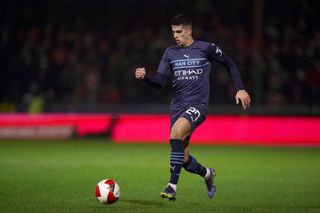 Manchester City’s Joao Cancelo during the Emirates FA Cup third round match at the Energy Check County Ground, Swindon. Picture date: Friday January 7, 2022