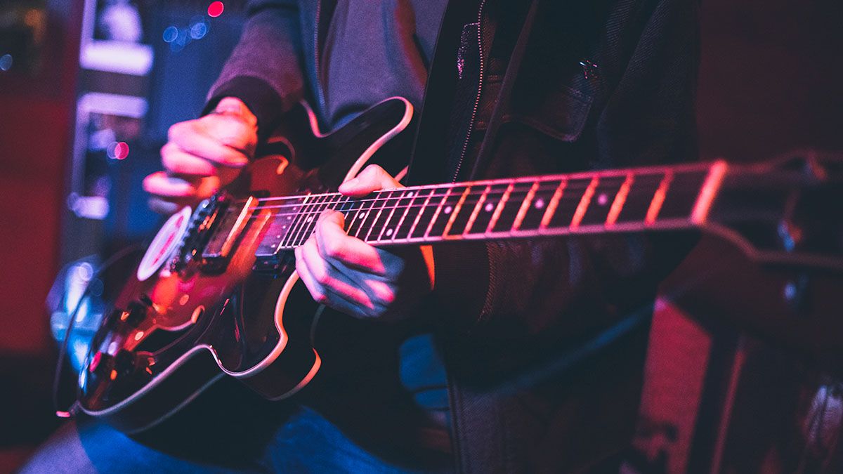 Guitar playing stock photo