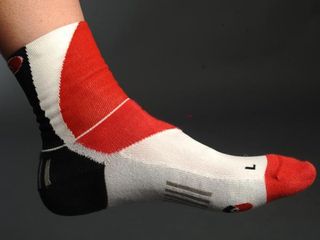 The asymmetrical left- and right-specific socks fit perfectly on your similarly asymmetrical feet - and, of course, ensure the logos are in the right place.
