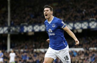 Everton’s Gareth Barry celebrates scoring his side’s first goal during the Barclays Premier League match at Goodison Park, Everton