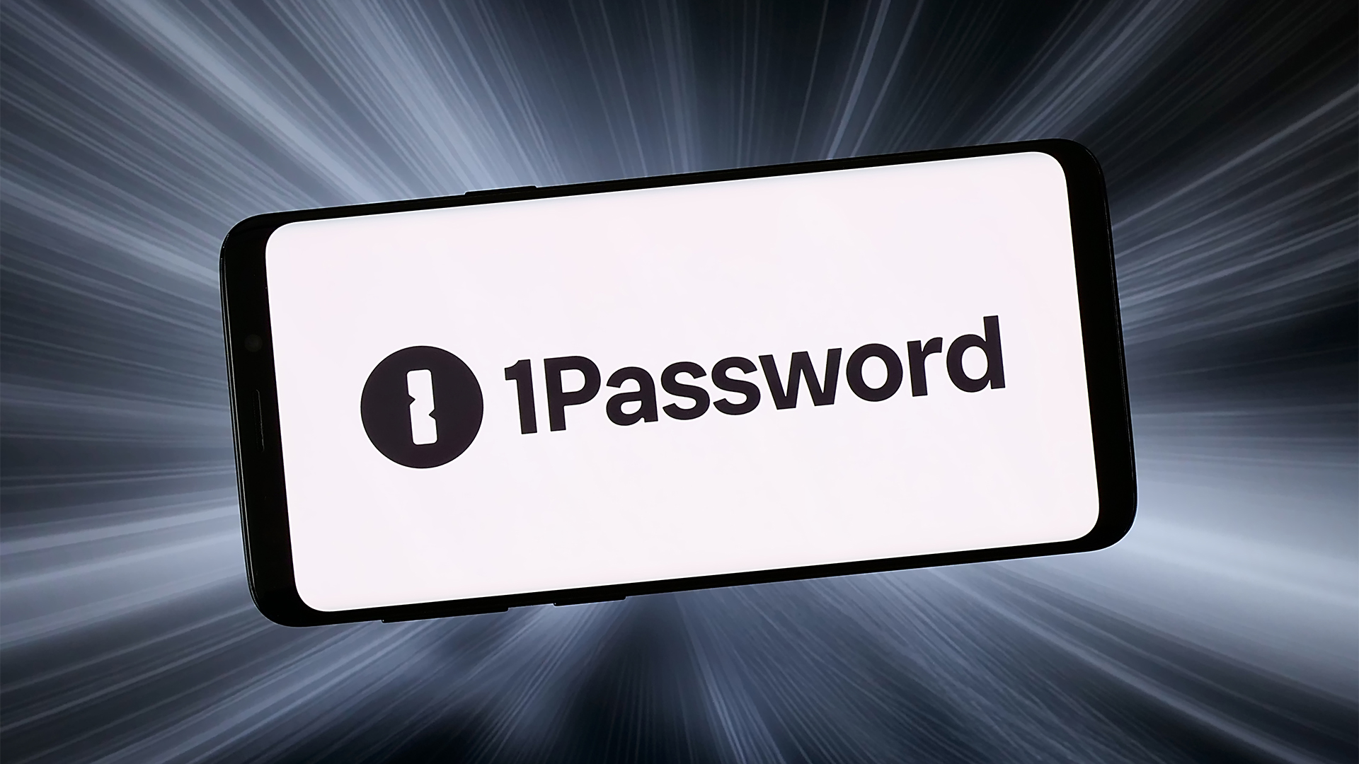1Password logo and branding pictured on a smartphone screen with grey glowing streams of light emanating out from behind the device.