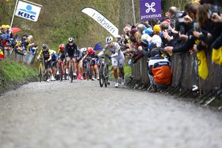 OUDENAARDE, BELGIUM - MARCH 31: (L-R) Demi Vollering of The Netherlands and Lotte Kopecky of Belgium and Team SD Worx - Protime compete passing through the Koppenberg cobblestones sector during the 21st Ronde van Vlaanderen - Tour des Flandres 2024 - Women's Elite a 163km one day race from Oudenaarde to Oudenaarde / #UCIWWT / on March 31, 2024 in Oudenaarde, Belgium. (Photo by Rafa Gomez - Pool/Getty Images)
