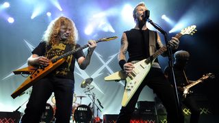Dave Mustaine (L) and James Hetfield of Metallica perform at Day Four of the bands' 30th Anniversary shows at The Fillmore on December 10, 2011 in San Francisco, California