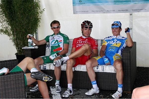 The riders relax before the start.
