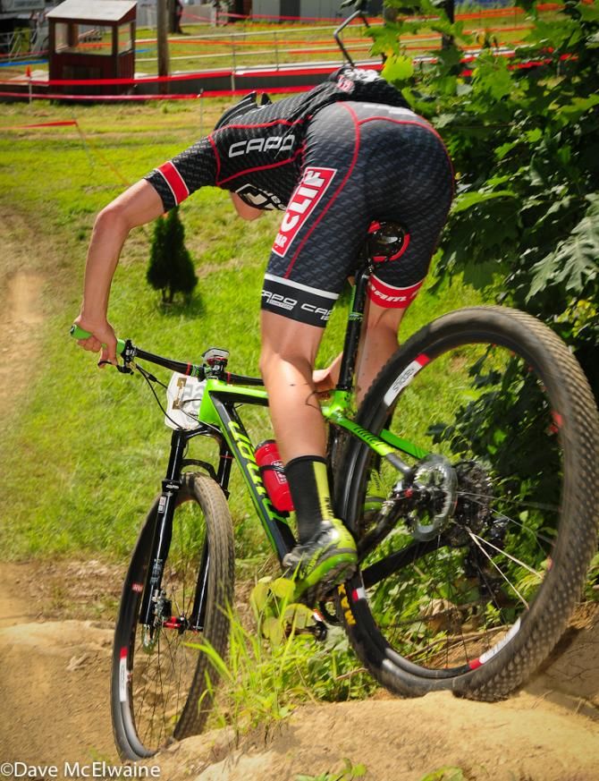 Garrett Gerchar (Cliff Bar) riding over a drop