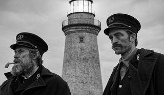 The Lighthouse, with Willem Dafoe and Robert Pattinson standing outside