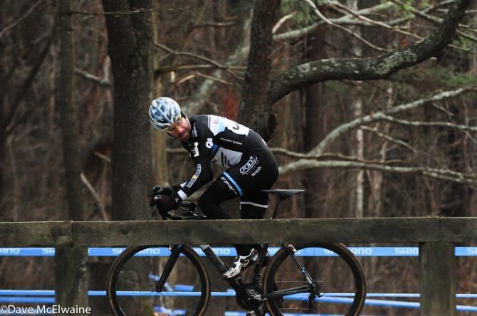 Shawn Milne (Keough Cyclocross) checks behind him before entering the finishing straightaway