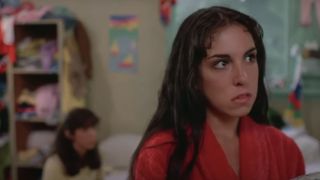 Karen Fields as Judy darting her eyes to the side in Sleepaway Camp