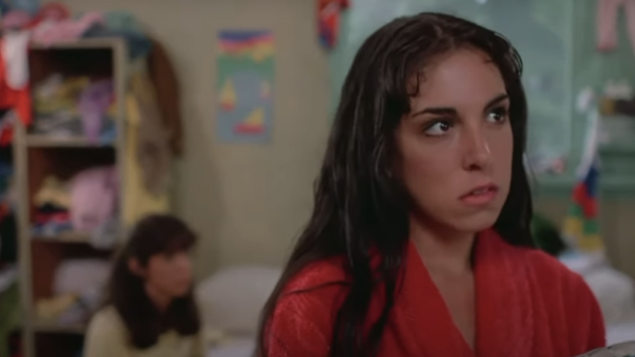 Karen Fields as Judy darting her eyes to the side in Sleepaway Camp