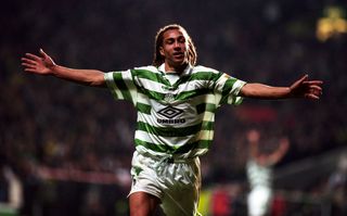 Henrik Larsson celebrates a goal for Celtic against Dundee United in November 1997.