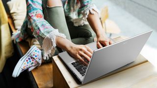 Acer Swift Go 14 on a table being used