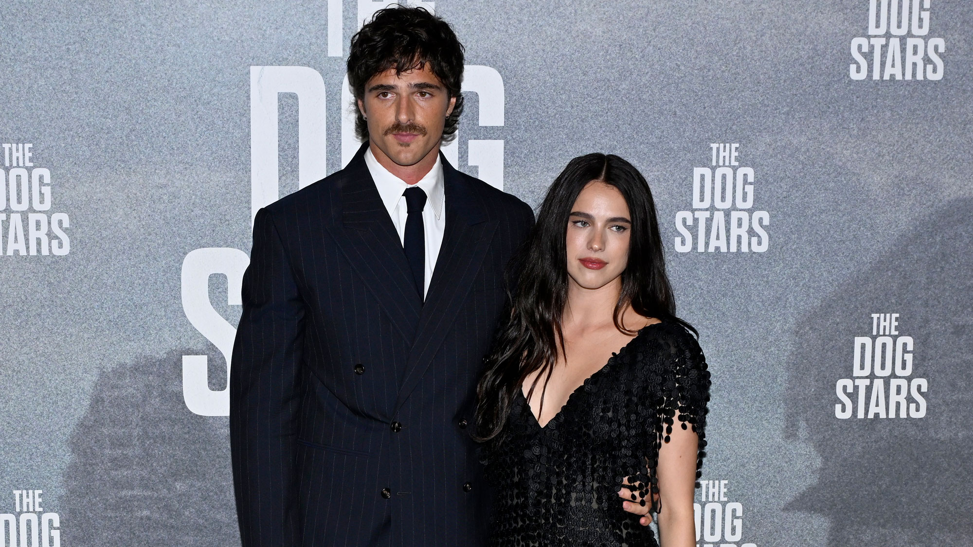 Margaret Qualley wears Chanel barefoot sandals on the red carpet with Jacob Elordi