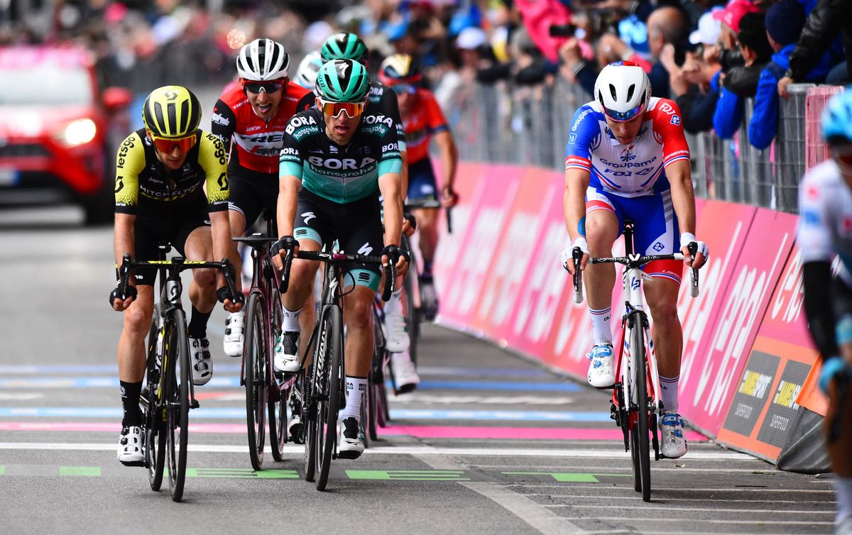 Simon Yates (Mitchelton-Scott) gets to the line on stage 4 of the 2019 Giro d'Italia having lost 18 seconds in a crash
