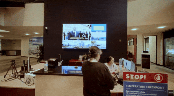 A circling view of a new Samsung display in an office space. 