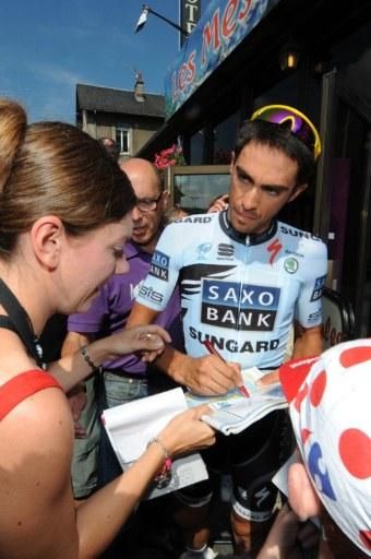 Alberto Contador has time to sign a few autographs before he heads out for the day's ride. The Spaniard is currently 16th in the overall standings.