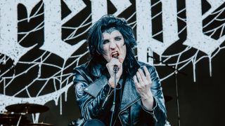 Will Ghould snarling on stage