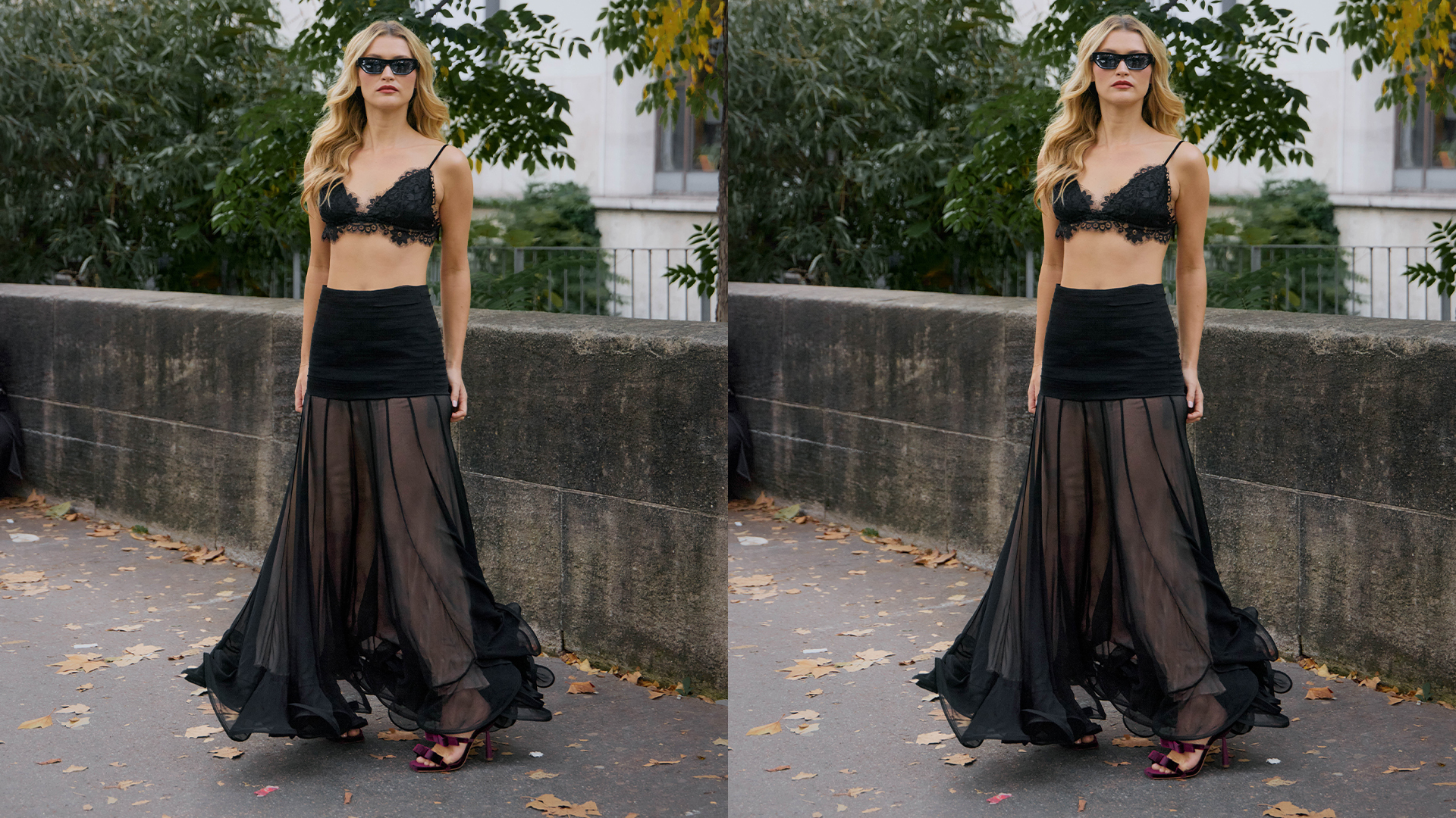 Woman wears black lace bra and long flowying sheer skirt and deep red velvet heels. 
