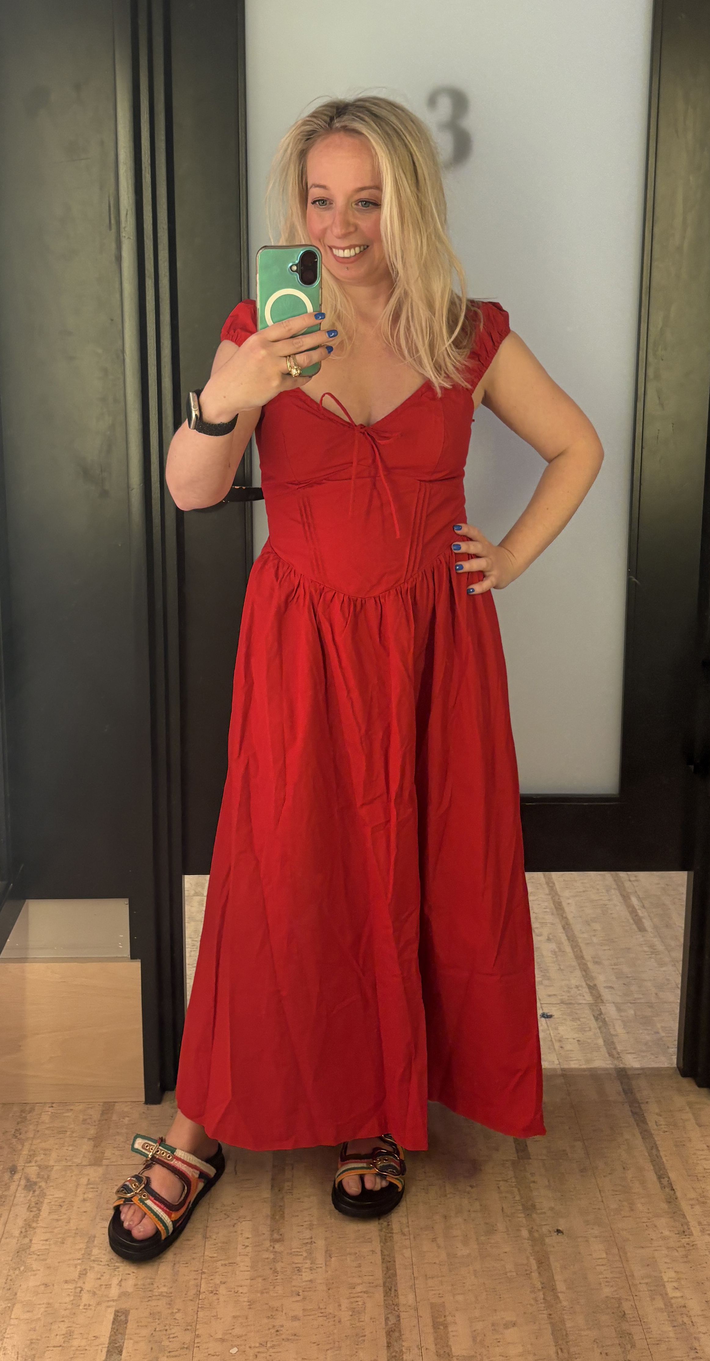 Antonia Kraskowski wearing a red built in bra dress