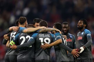 Giovanni Simeone of SSC Napoli celebrates with teammates after scoring their team's sixth goal during the UEFA Champions League group A match between AFC Ajax and SSC Napoli at Johan Cruyff Arena on October 04, 2022 in Amsterdam, Netherlands.