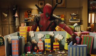 deadpool 2 playing with toys