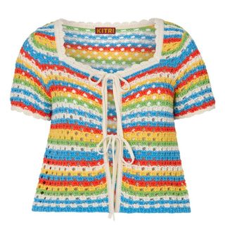 flat lay of kitri drew rainbow crochet cardigan