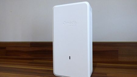 The TP-Link Omada EAP775 Wall 4 on a desk