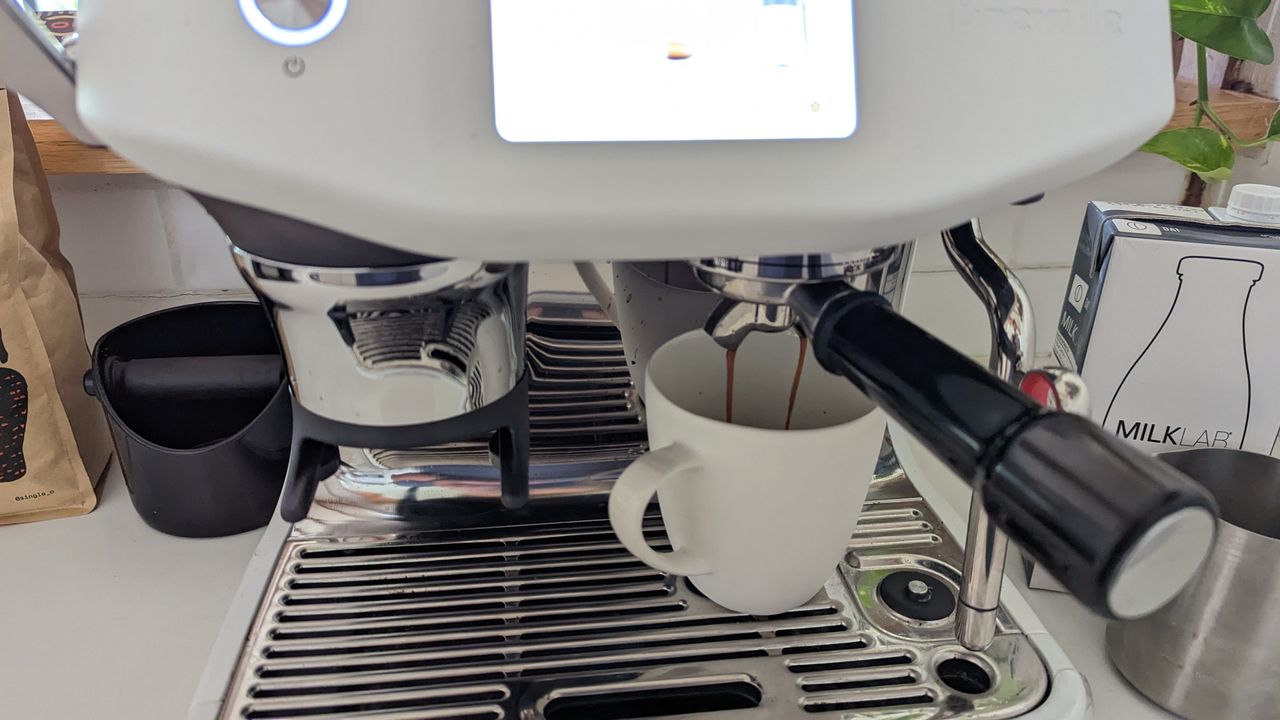 The Barista Touch Impress in various stages of use