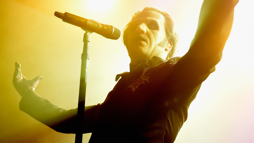 Tobias Forge performing onstage as Cardinal Copia with Ghost in 2018