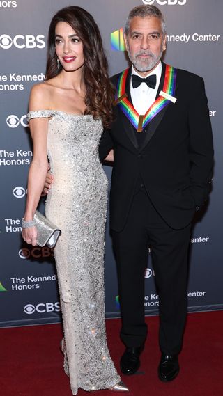 Honoree George Clooney (R) and Amal Clooney attend the 45th Kennedy Center Honors ceremony at The Kennedy Center on December 04, 2022 in Washington, DC.