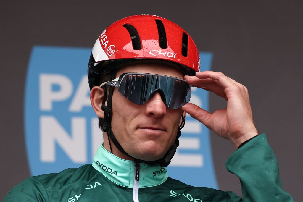 Arkea-B&amp;B Hotels' French rider Arnaud Demare wearing the sprinter's green jersey reacts prior to the 2nd stage of the Paris-Nice cycling race, 183,9 km between Montesson and Bellegarde, on March 10, 2025. (Photo by Anne-Christine POUJOULAT / AFP)