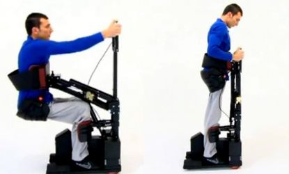 Yusaf Akturkoglu, whose lower body is paralyzed, uses the Tek RMD robotic wheelchair to stand up.
