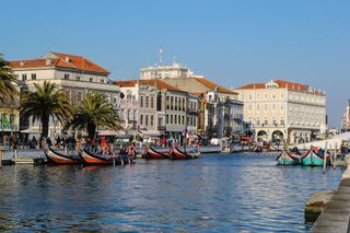 Colorful canal boats in the city of Aveiro, Portugal.