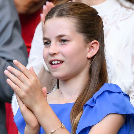 Princess Charlotte wearing a blue dress at Wimbledon