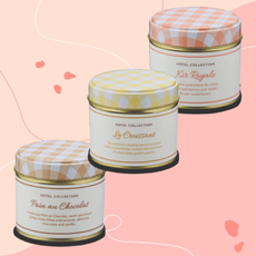 Aldi croissant candles, pain au chocolat candle and kir royal candle on pink background.