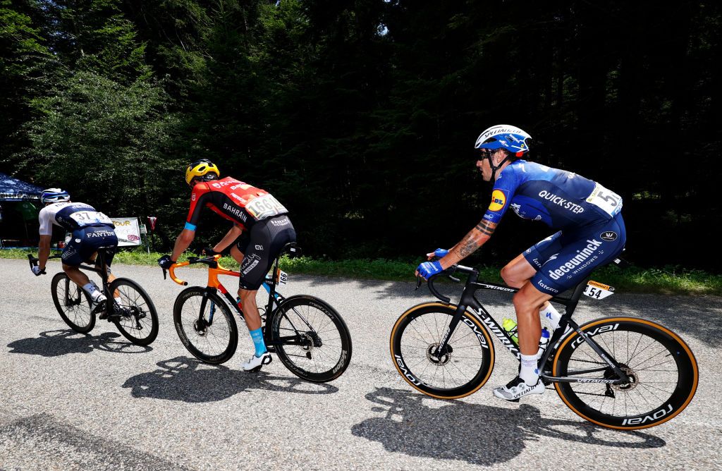 QUILLAN FRANCE JULY 10 Michael Woods of Canada and Team Israel StartUp Nation Wout Poels of The Netherlands and Team Bahrain Victorious Mattia Cattaneo of Italy and Team Deceuninck QuickStep in the Breakaway during the 108th Tour de France 2021 Stage 14 a 1837km stage from Carcassonne to Quillan LeTour TDF2021 on July 10 2021 in Quillan France Photo by Chris GraythenGetty Images