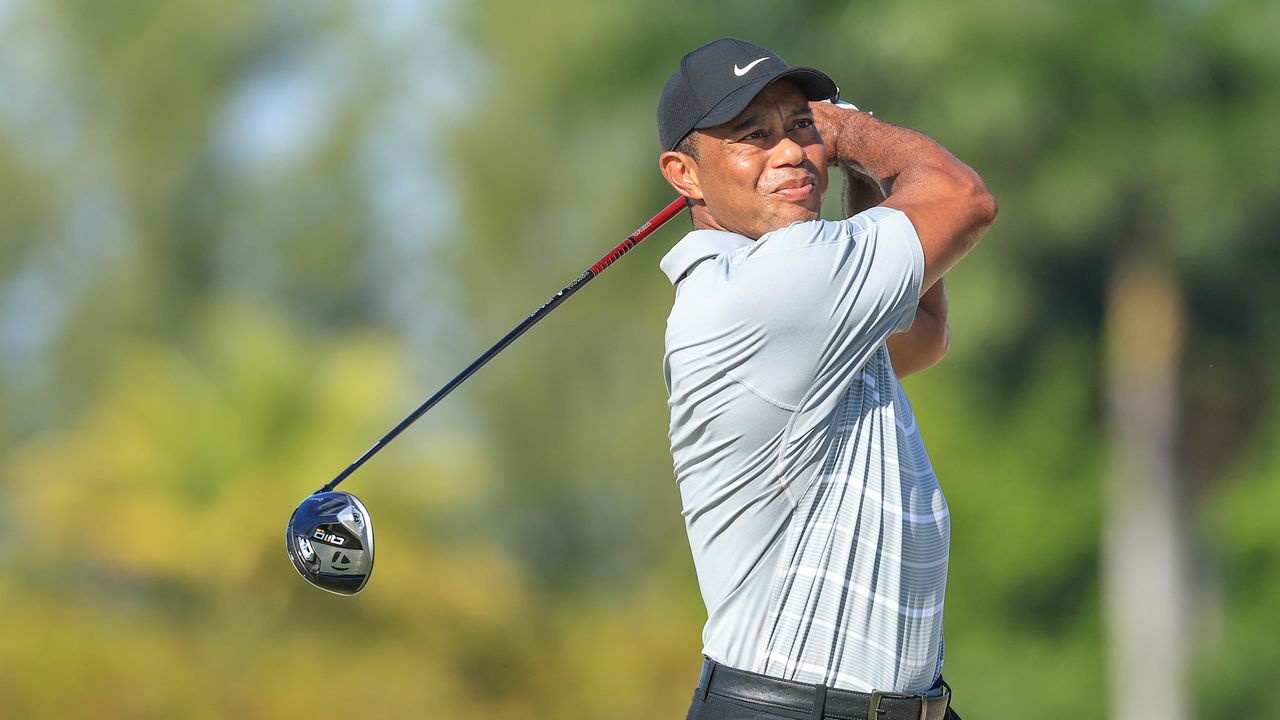 Tiger Woods hits a drive