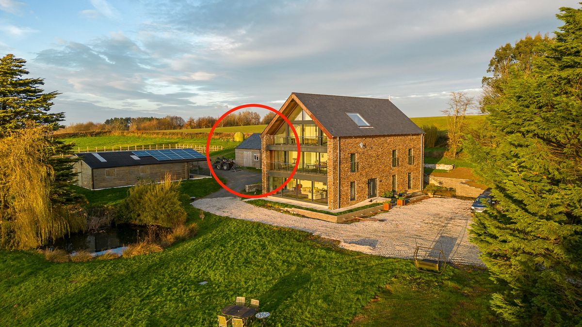 The large eco home with layers of balconies and an American style barn and bat palace 